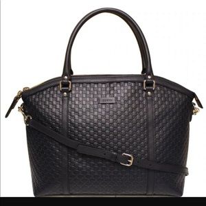 Black leather micro Guccissima cross body / shoulder strap bag